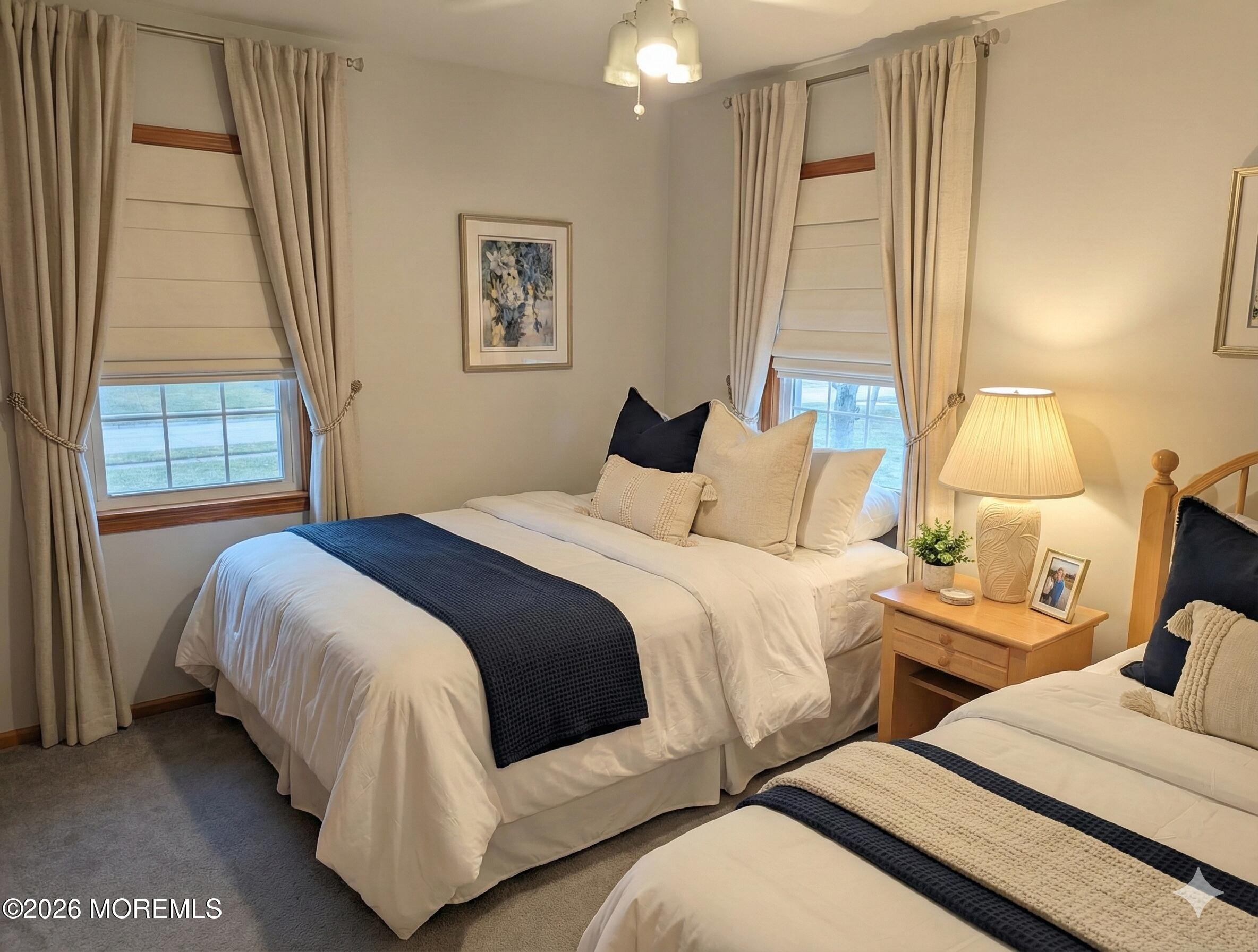 2400 Oceanfront Lavallette, NJ 08735 - Photo 12 of 29 a bedroom with two beds and a large window