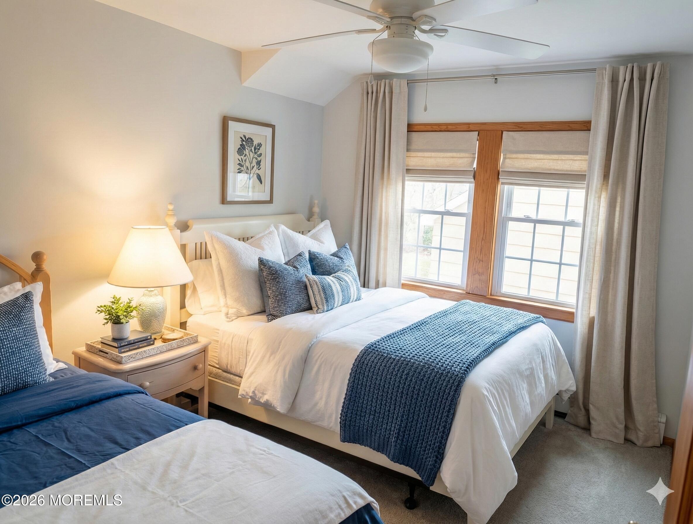 2400 Oceanfront Lavallette, NJ 08735 - Photo 13 of 29 a bedroom with two beds and a large window