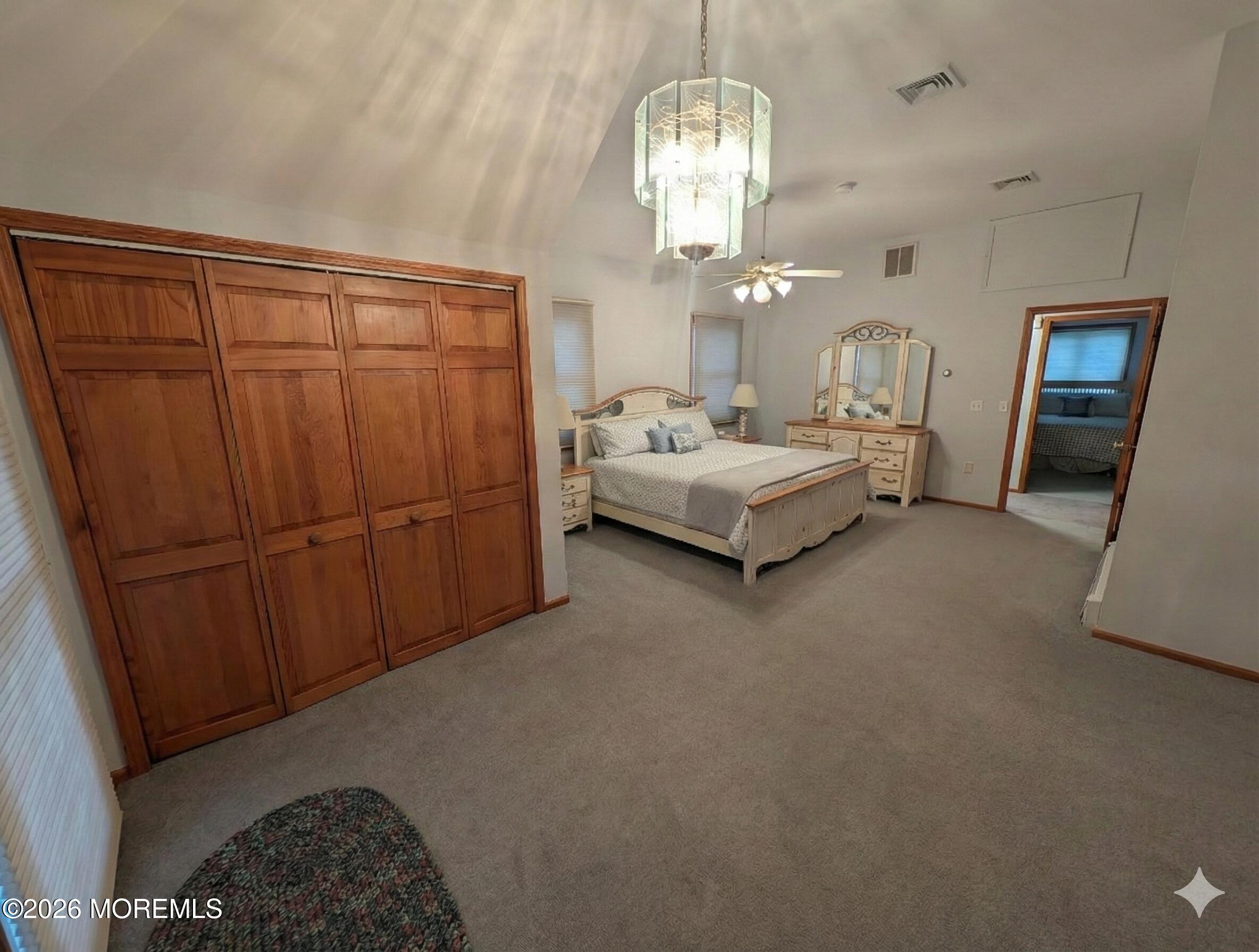 2400 Oceanfront Lavallette, NJ 08735 - Photo 20 of 29 a very nice looking room with a chandelier