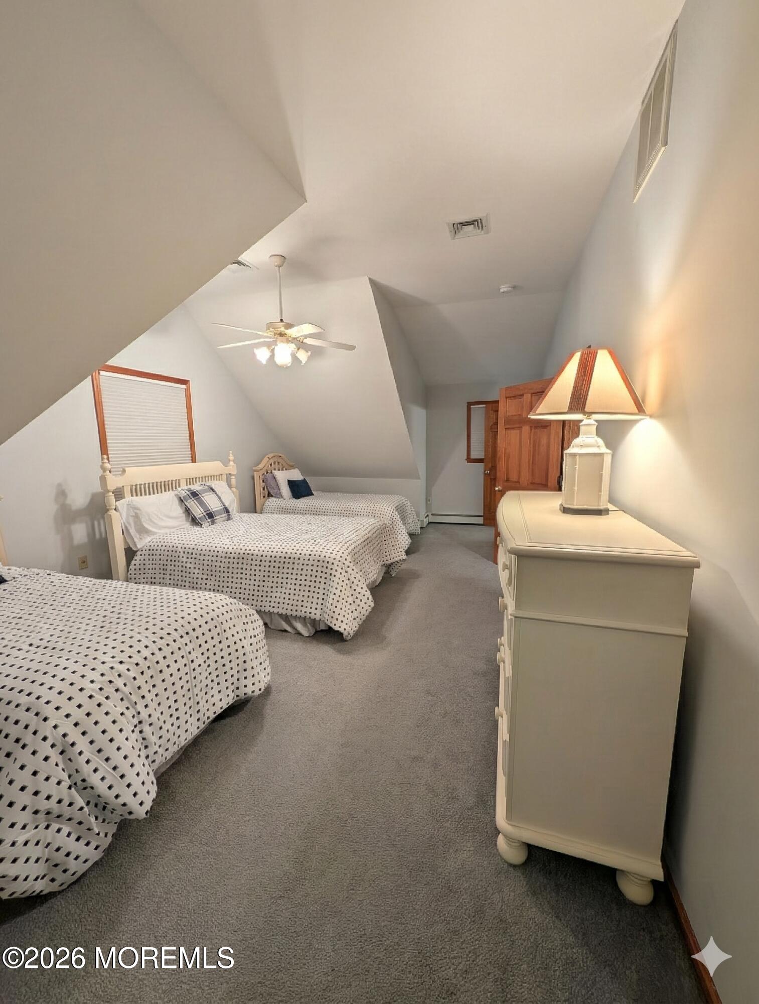 2400 Oceanfront Lavallette, NJ 08735 - Photo 21 of 29 a living room with two bed and a lamp