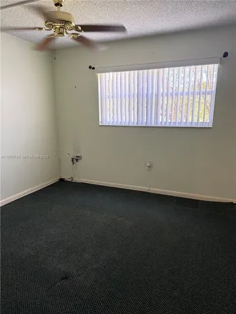 a view of a room with a window