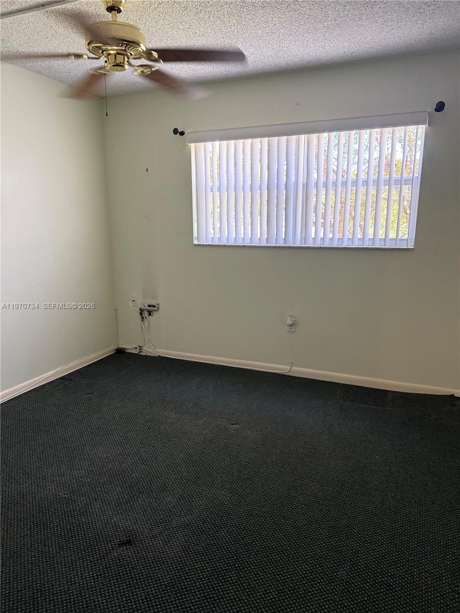 2721 North Pine Island Road, Unit 202 Sunrise, FL 33322 - Photo 7 of 12 a view of a room with a window