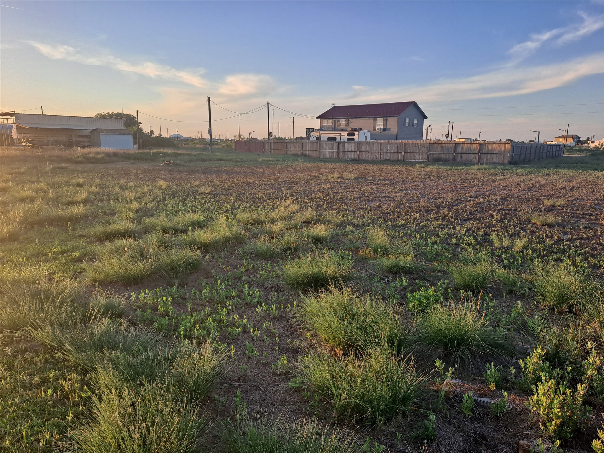 0 Blue Water Road Sargent, TX 77414 - Photo 2 of 3 a view of a dry yard with trees
