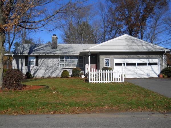 7 Dragon Circle Easthampton, MA 01027 - Photo 1 of 1 a front view of a house with garden