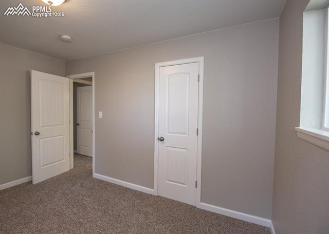 408 Placid Road Colorado Springs, CO 80910 - Photo 15 of 36 You will find a nice-sized closet in Bedroom #2.