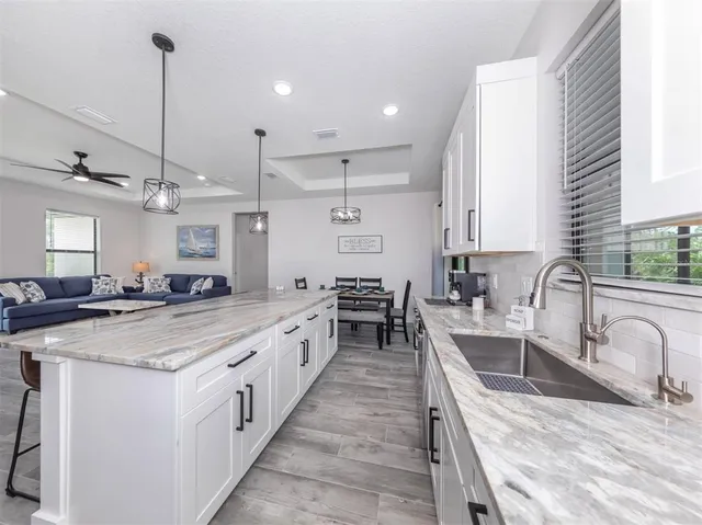 a view of a room that has a table and chair