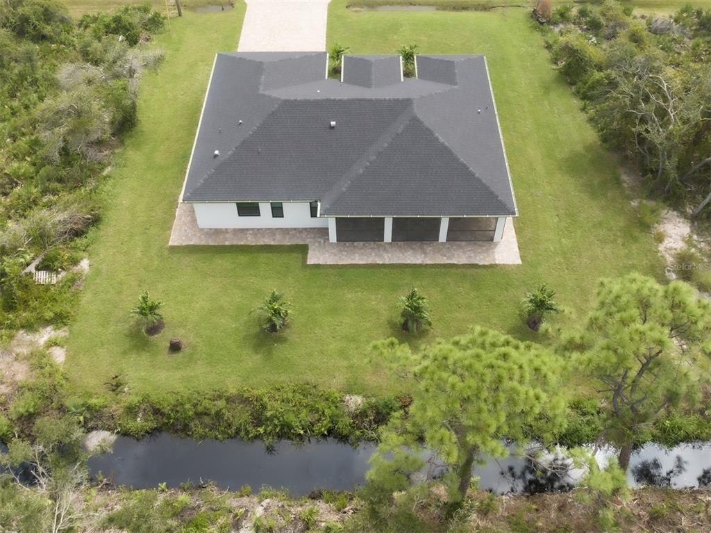 17566 De Miranda Avenue North Port, FL 34287 - Photo 34 of 94 an aerial view of a house with a yard