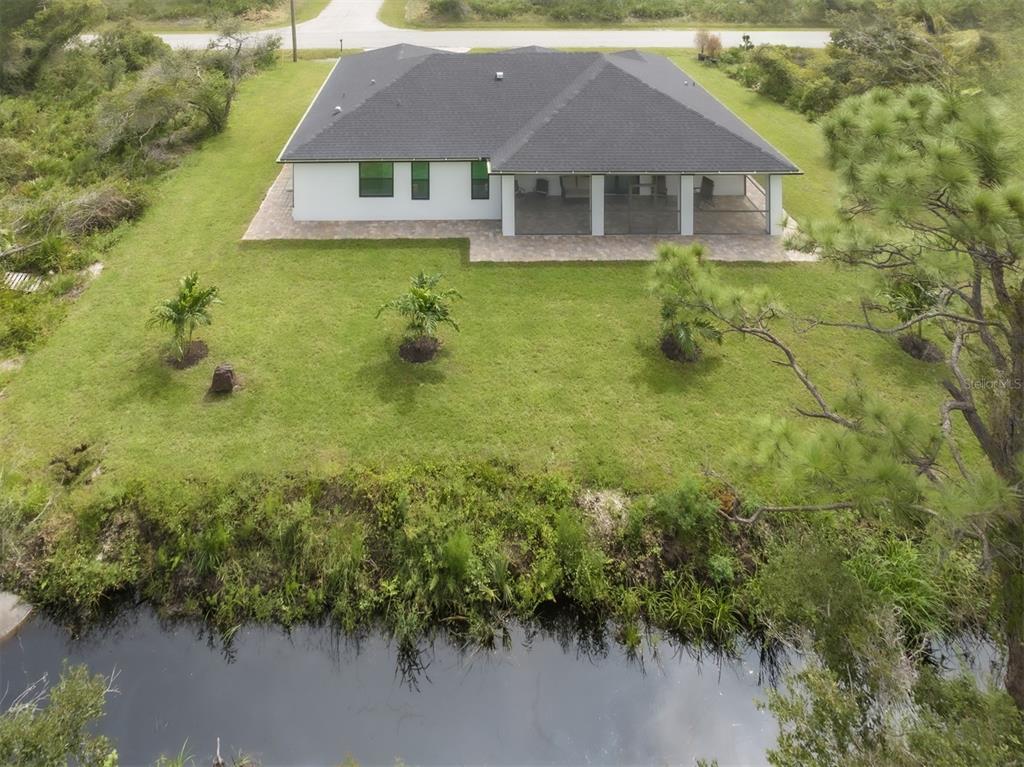 17566 De Miranda Avenue North Port, FL 34287 - Photo 35 of 94 a aerial view of a house with a yard