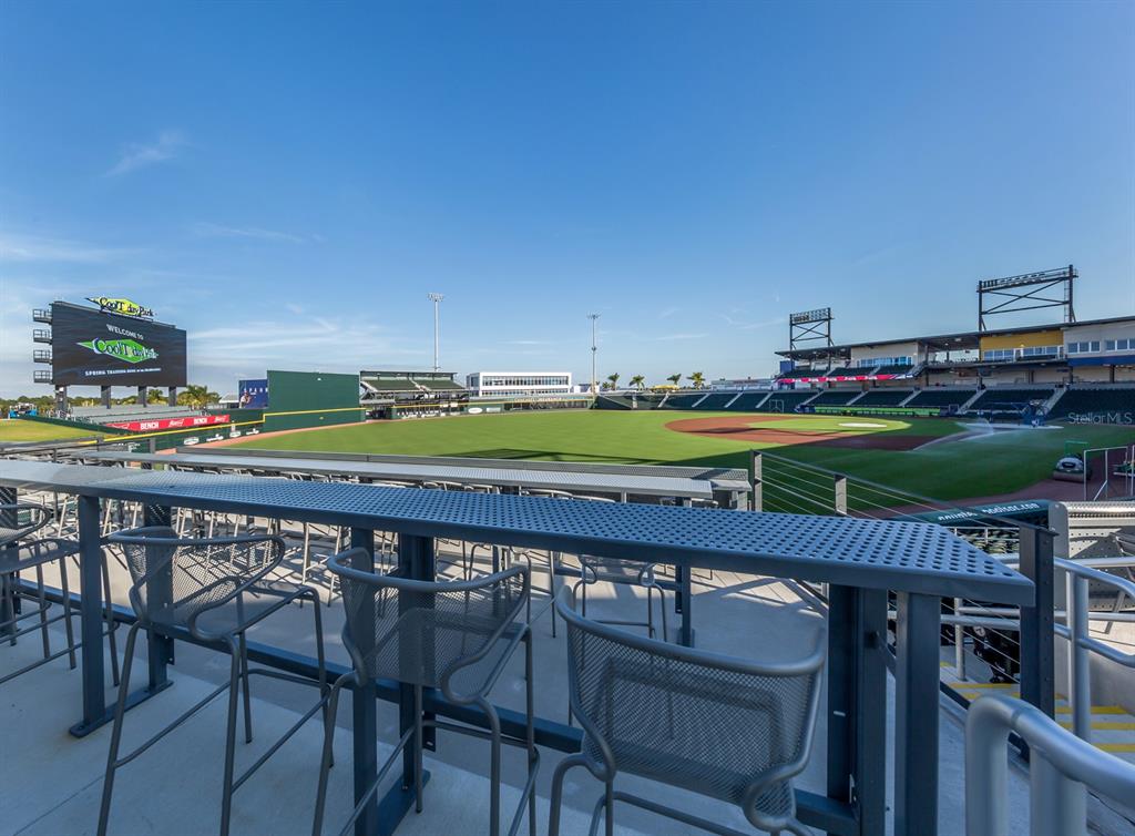 17566 De Miranda Avenue North Port, FL 34287 - Photo 40 of 94 a view of a balcony with two chairs and a table