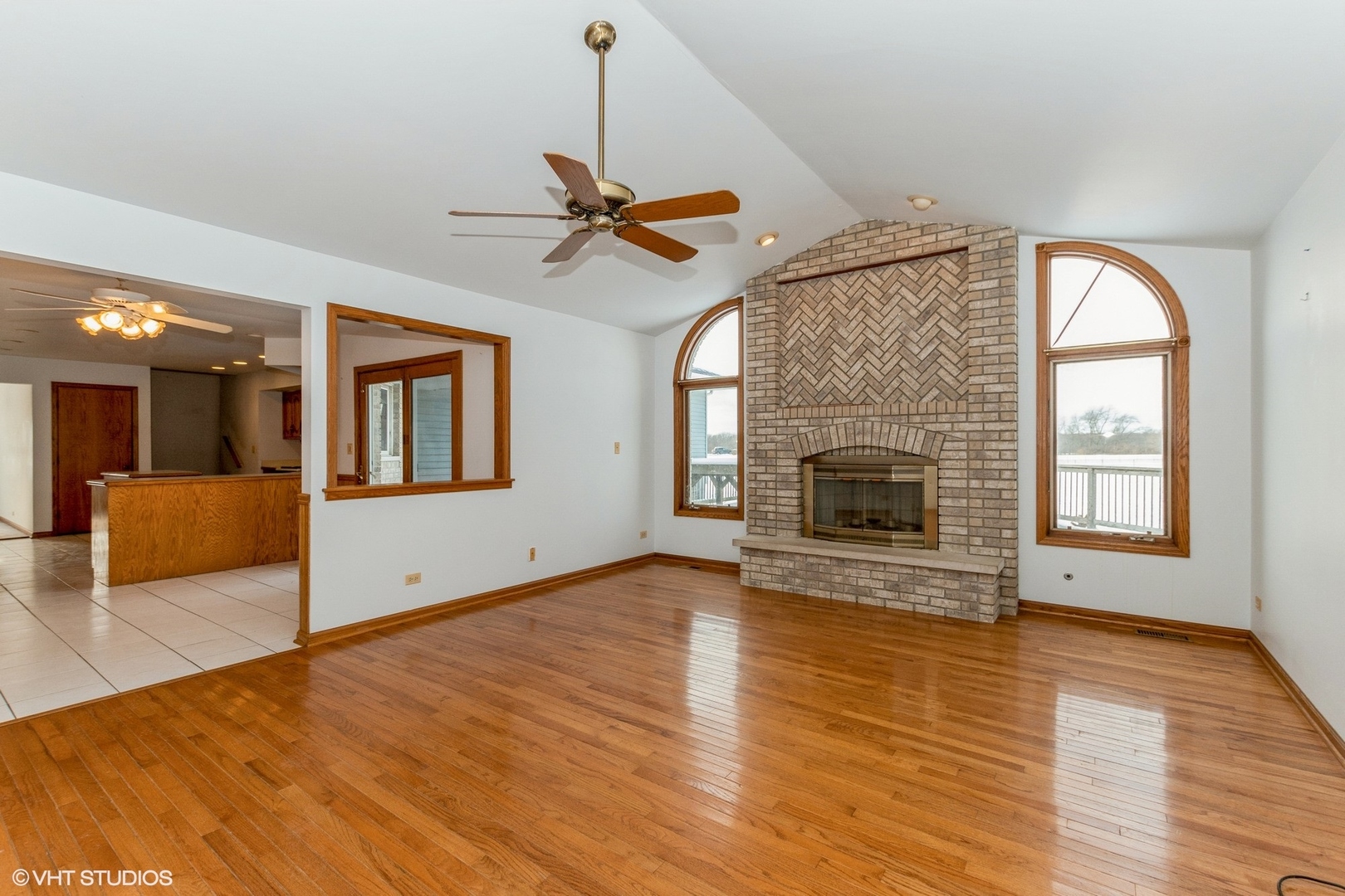 29460 South Wallingford Road Manhattan, IL 60442 - Photo 12 of 22 a view of an empty room with a fireplace and a window