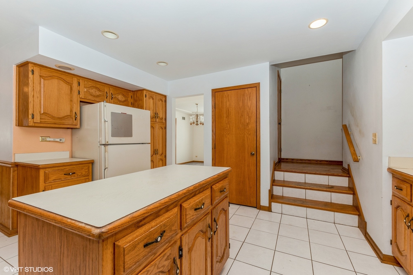 29460 South Wallingford Road Manhattan, IL 60442 - Photo 7 of 22 a kitchen with a refrigerator a stove top oven and cabinets