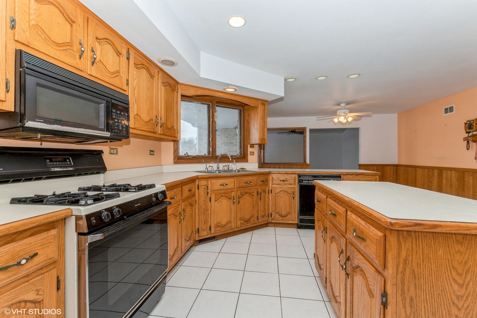 29460 South Wallingford Road Manhattan, IL 60442 - Photo 8 of 22 a kitchen with stainless steel appliances granite countertop a stove a sink and a microwave