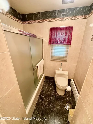 $1,399,000 | 59 Bogert Avenue | Todt Hill