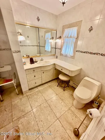 $1,399,000 | 59 Bogert Avenue | Todt Hill