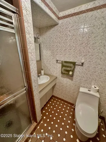 $1,399,000 | 59 Bogert Avenue | Todt Hill