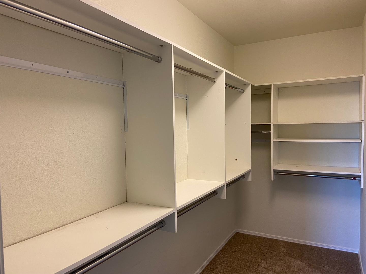1330 East Pedro Road Phoenix, AZ 85042 - Photo 21 of 50 a view of an empty walk in closet