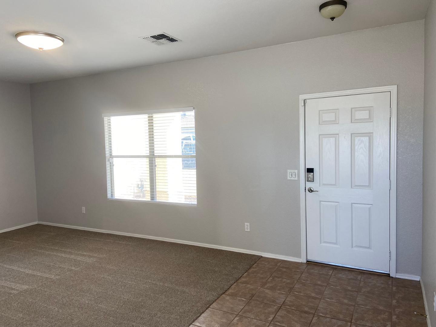 1330 East Pedro Road Phoenix, AZ 85042 - Photo 24 of 50 a view of an empty room with a window