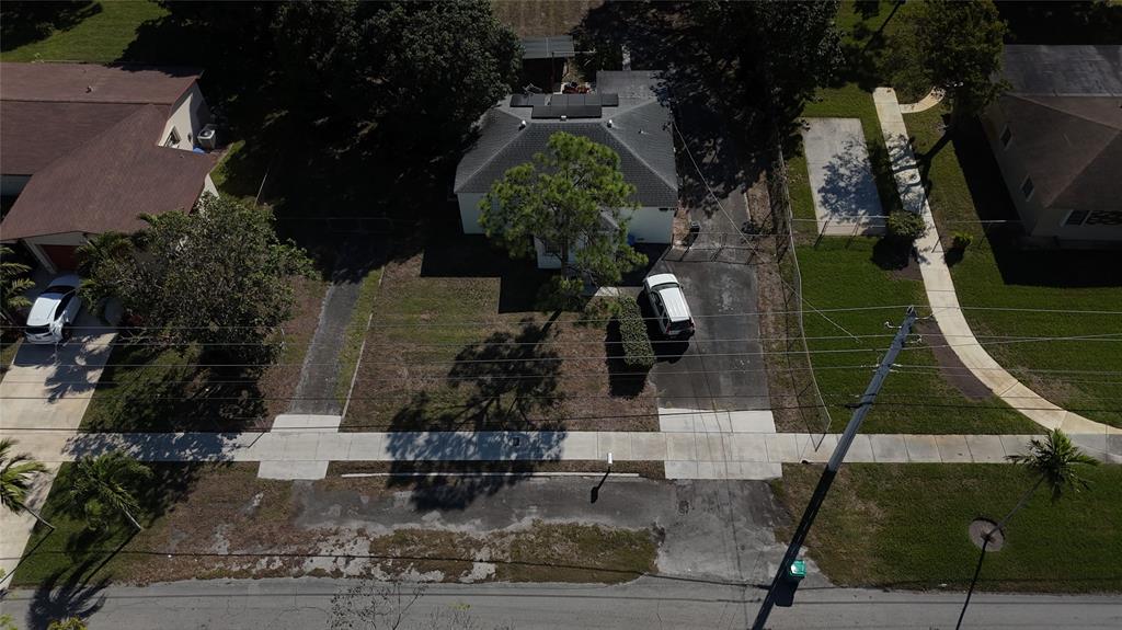 940 Northwest 151st Street Miami, FL 33169 - Photo 13 of 13 an aerial view of houses with outdoor space