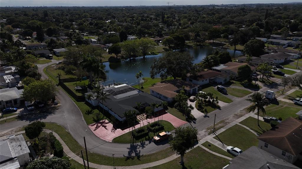 940 Northwest 151st Street Miami, FL 33169 - Photo 4 of 13 an aerial view of a house with a yard basket ball court