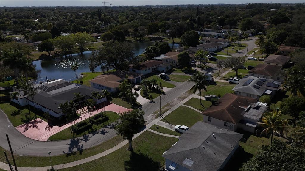 940 Northwest 151st Street Miami, FL 33169 - Photo 5 of 13 an aerial view of residential houses with outdoor space