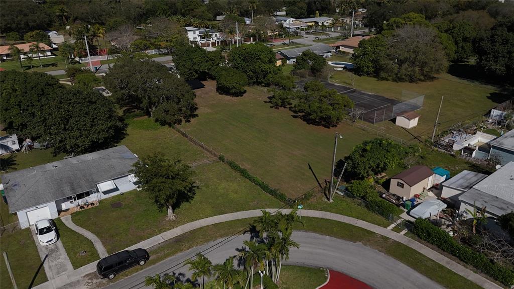 940 Northwest 151st Street Miami, FL 33169 - Photo 8 of 13 an aerial view of residential house with outdoor space