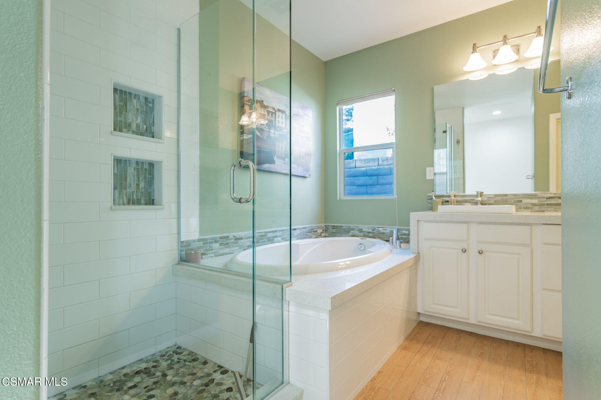791 Eisenhower Way Simi Valley, CA 93065 - Photo 26 of 59 a spacious bathroom with a granite countertop sink a mirror and shower