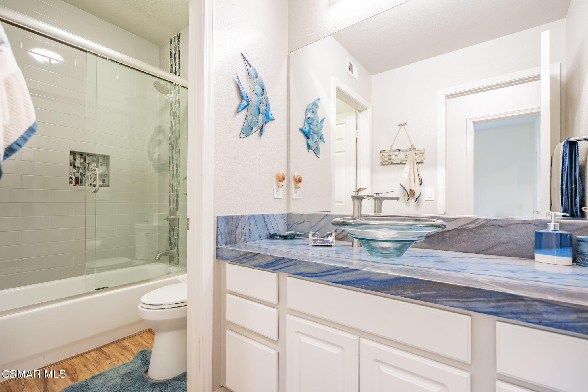 791 Eisenhower Way Simi Valley, CA 93065 - Photo 35 of 59 a bathroom with a granite countertop sink a toilet and a bathtub