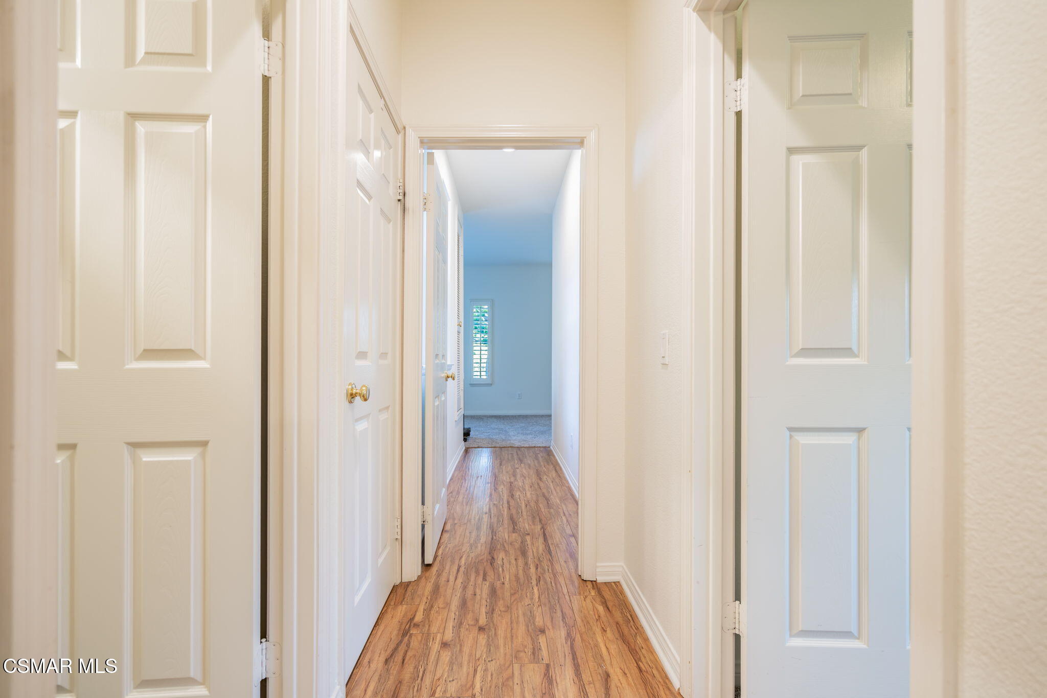 791 Eisenhower Way Simi Valley, CA 93065 - Photo 37 of 59 a view of a hallway with wooden floor