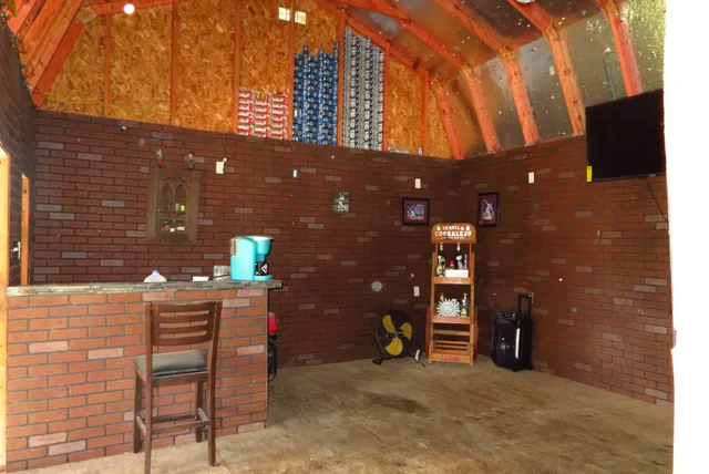 a view of a porch in front of house