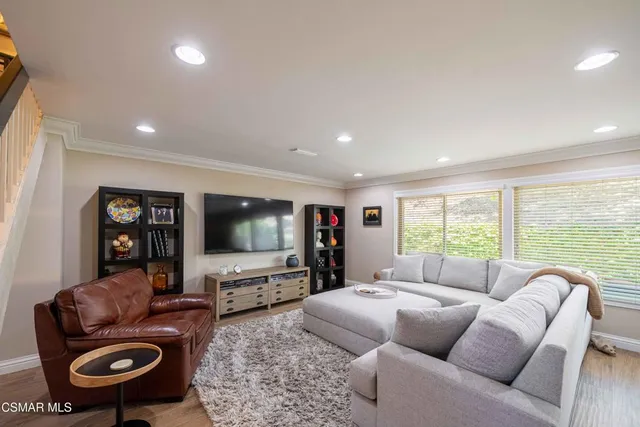 a kitchen with stainless steel appliances a sink stove and refrigerator