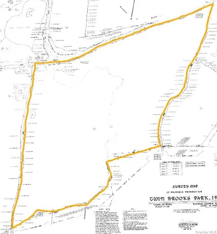 a picture of a room with a white wall and chair