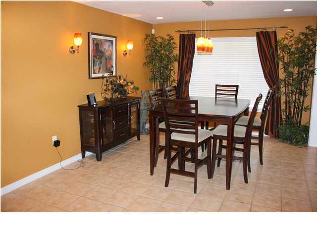 534 Driftwood Point Road Santa Rosa Beach, FL 32459 - Photo 10 of 32 a kitchen with a table and chairs