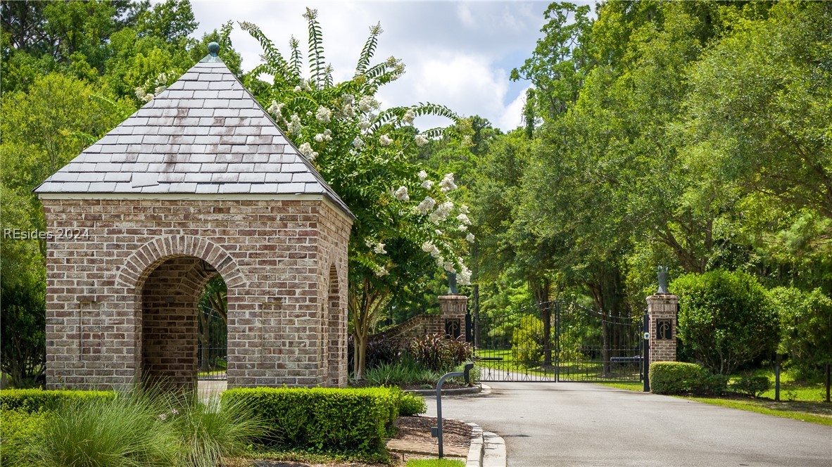 859 Bridle Path Boulevard Hardeeville, SC 29927 - Photo 3 of 40 The guard house and gates to the private Telfair Plantation