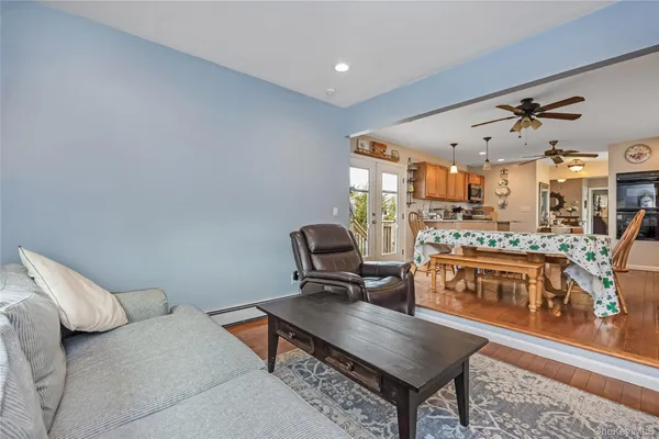 a living room with furniture and a table