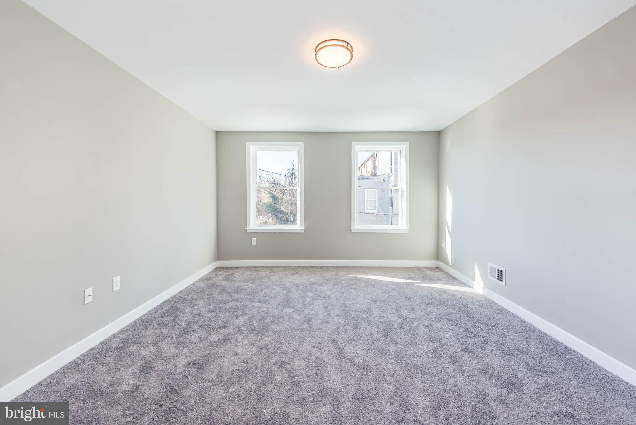 1330 Division Street Baltimore, MD 21217 - Photo 19 of 39 an empty room with windows