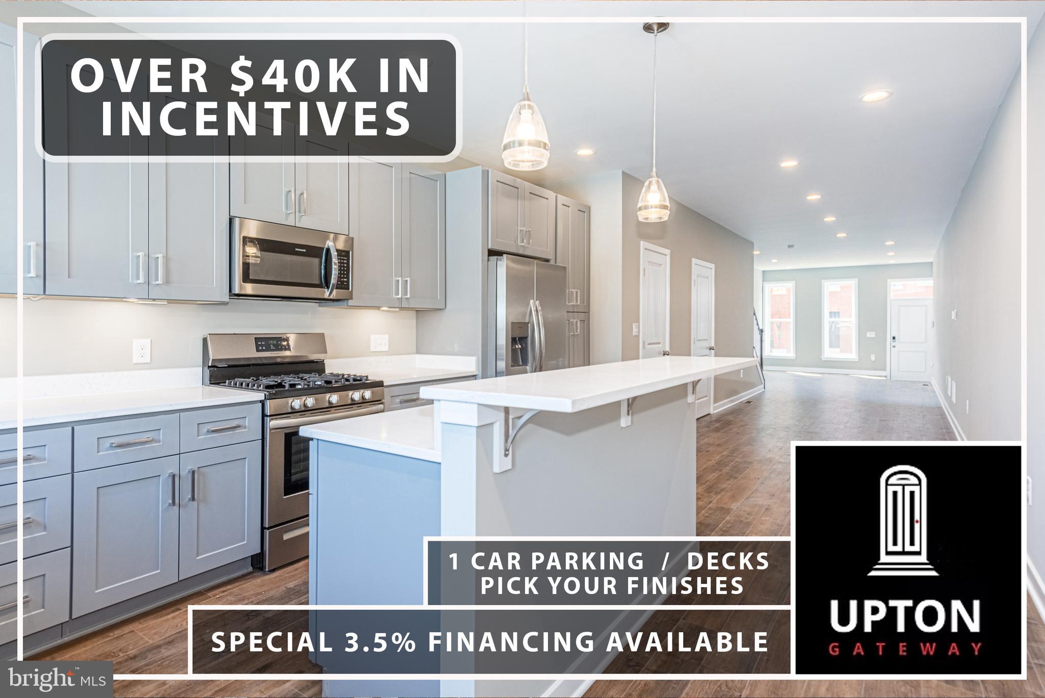 1330 Division Street Baltimore, MD 21217 - Photo 2 of 39 a kitchen with kitchen island granite countertop a refrigerator a stove top oven a sink and dishwasher