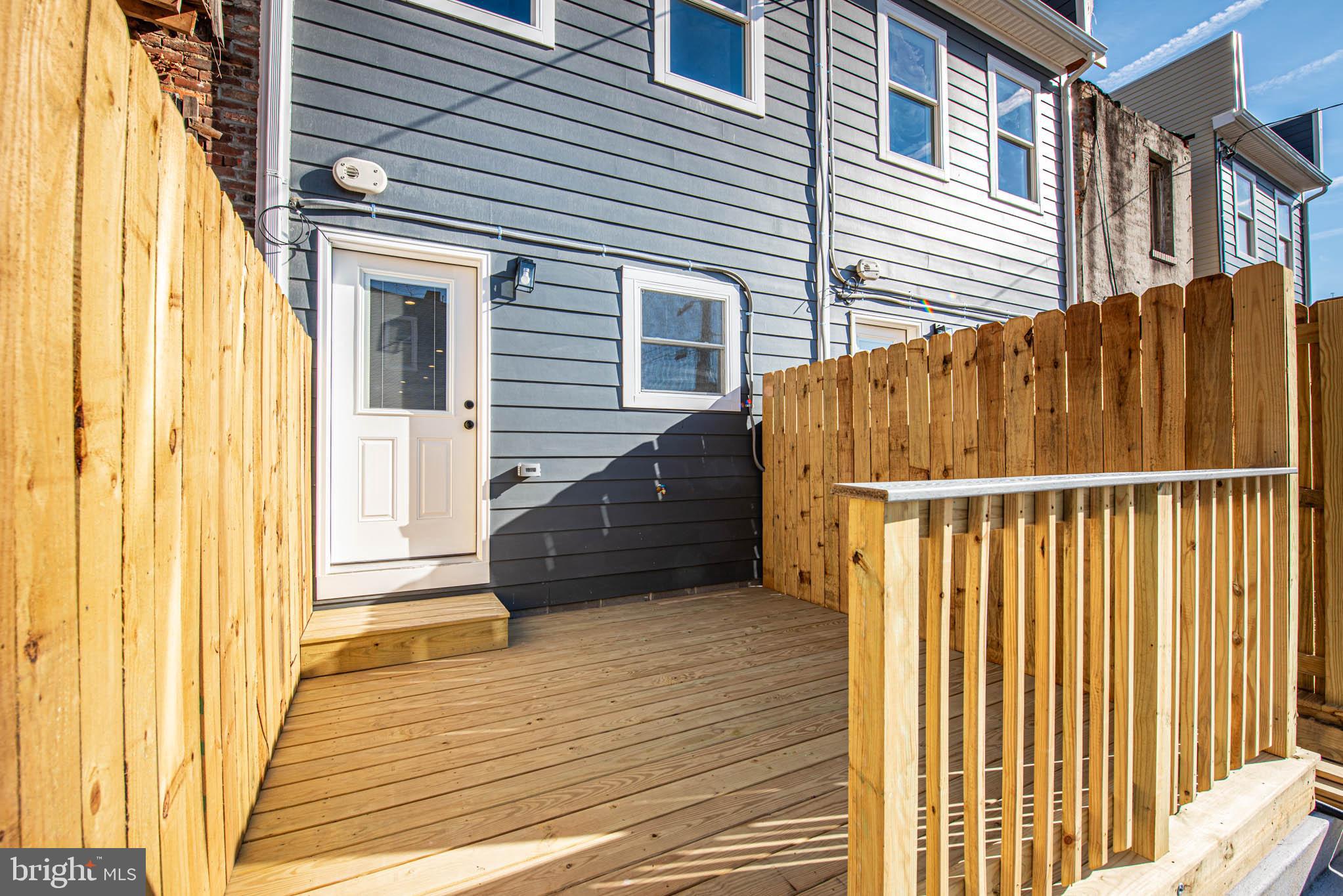 1330 Division Street Baltimore, MD 21217 - Photo 37 of 39 a view of a house with a door