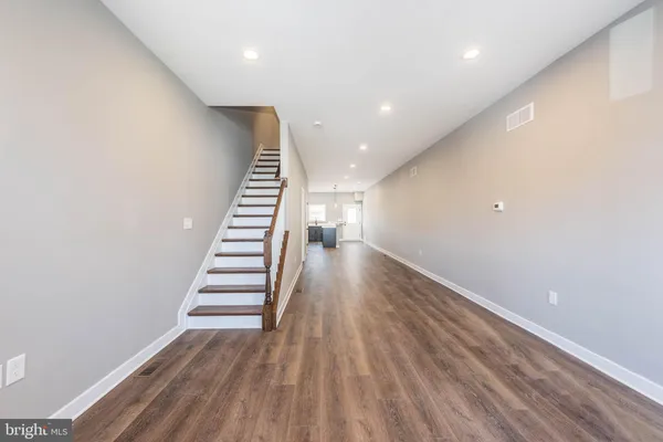 a view of entryway with wooden floor