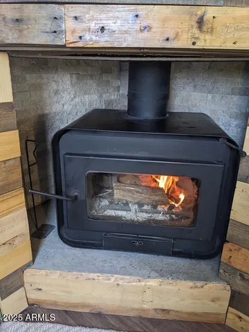 a fireplace with granite top