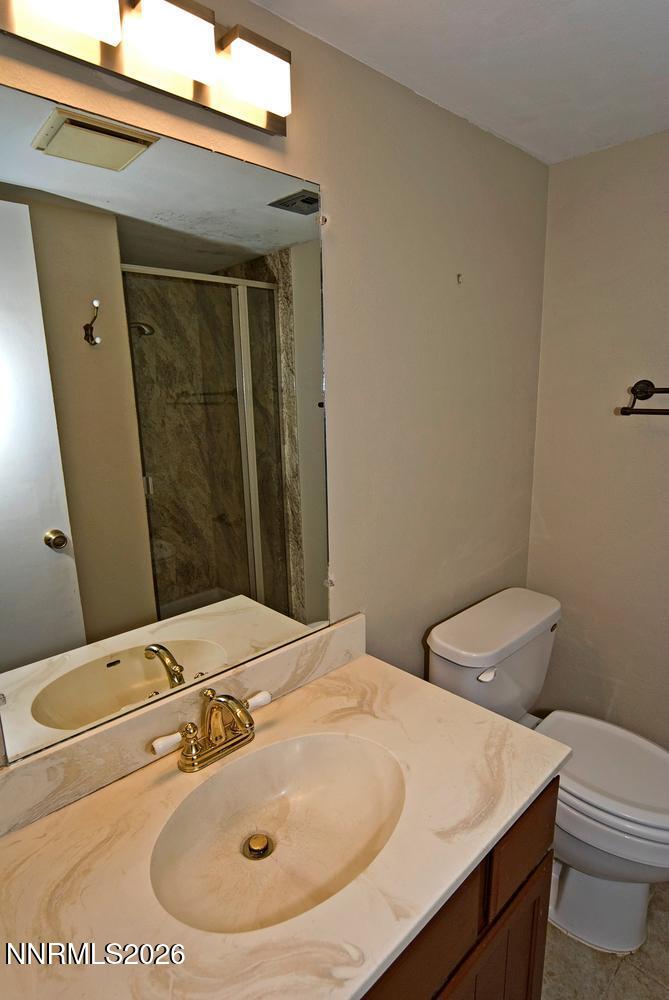 3185 Corey Drive Reno, NV 89509 - Photo 33 of 46 056-009-Downstairs Bathroom-670x1000