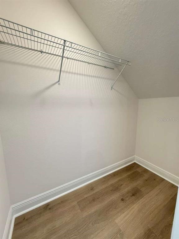 2265 Hen Road Minneola, FL 34715 - Photo 14 of 36 a view of a room with racks on the wall