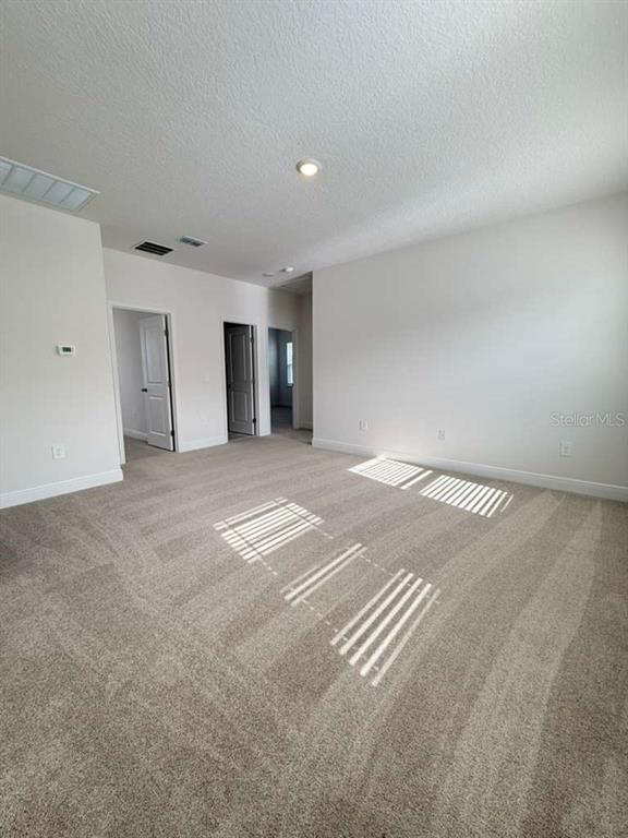 2265 Hen Road Minneola, FL 34715 - Photo 24 of 36 a view of empty room with wooden floor