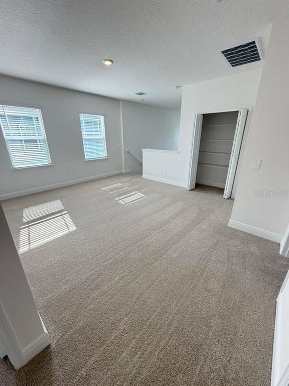 2265 Hen Road Minneola, FL 34715 - Photo 31 of 36 a view of an empty room with a window