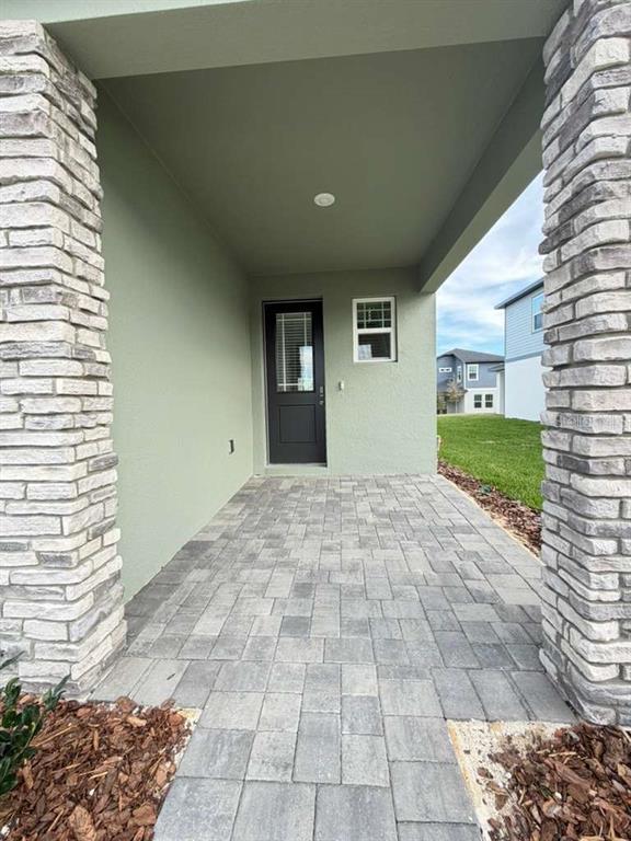 2265 Hen Road Minneola, FL 34715 - Photo 4 of 36 a view of an empty room with a window