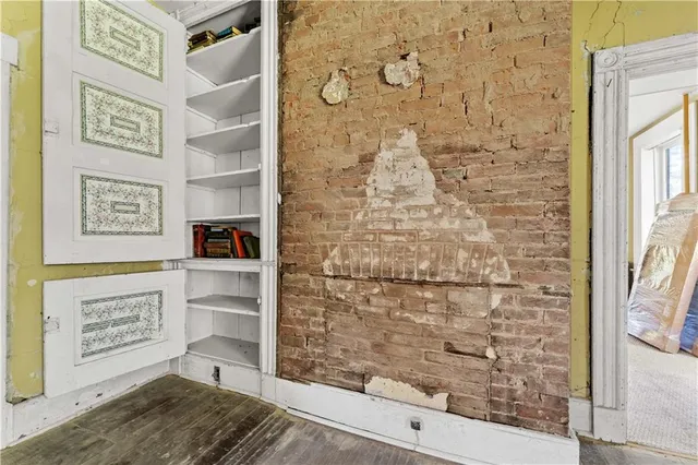 a bathroom with a shower and a sink