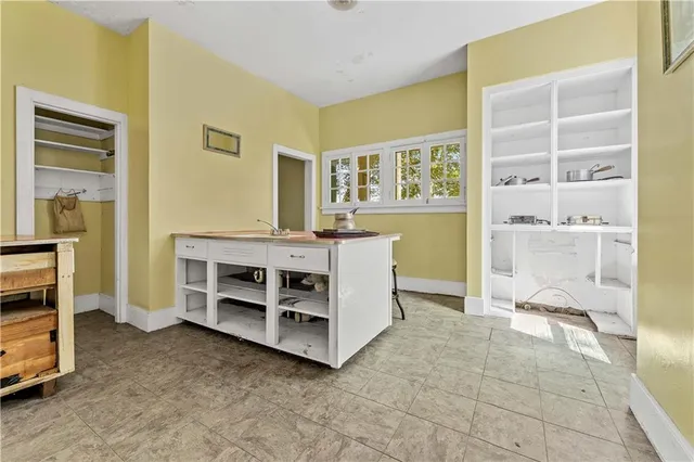 a bedroom with a bed and a cabinets