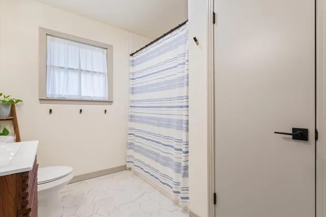 a bathroom with a toilet