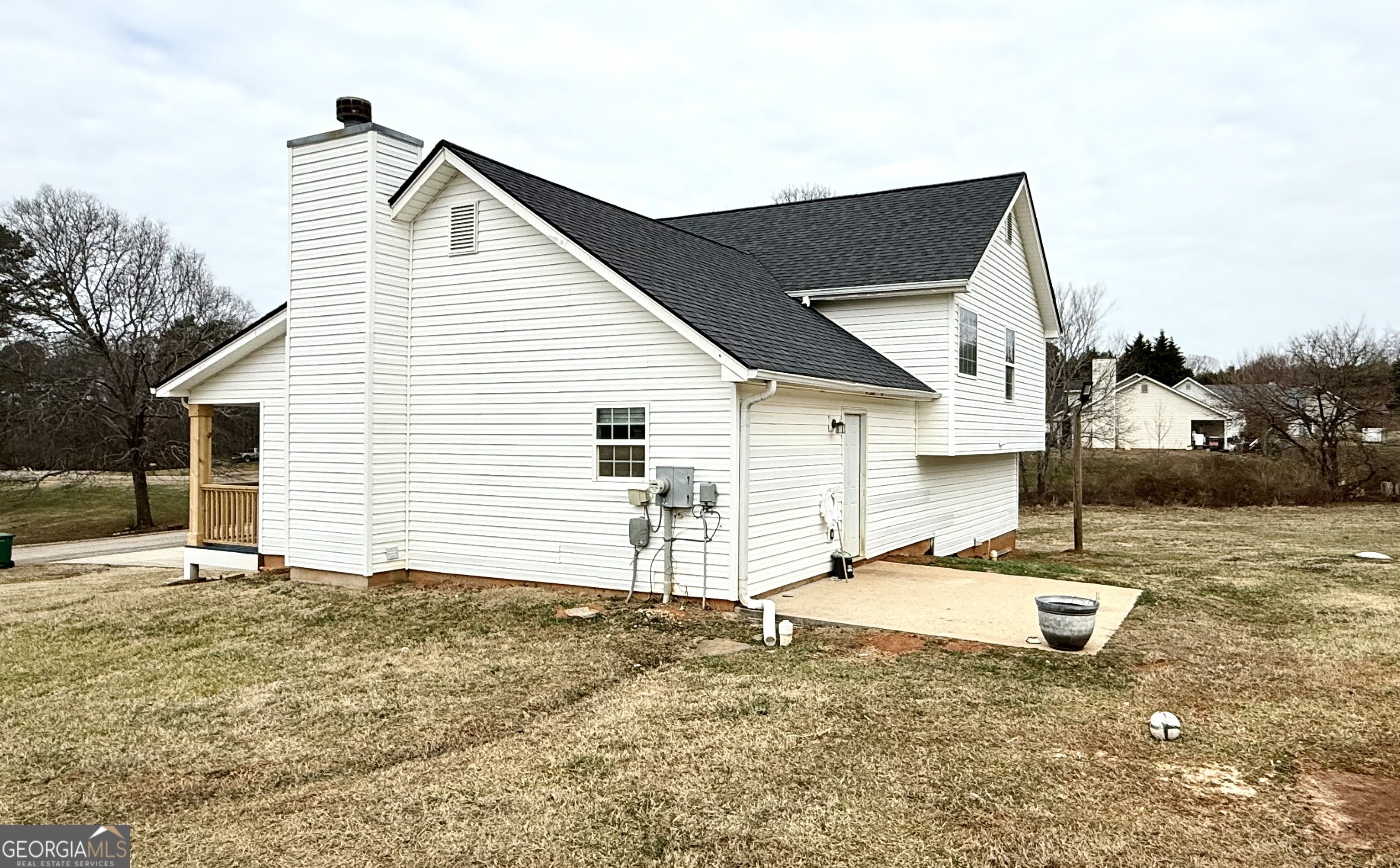 110 Waterloo Drive Mount Airy, GA 30563 - Photo 18 of 24 a backyard of a house with yard and garage