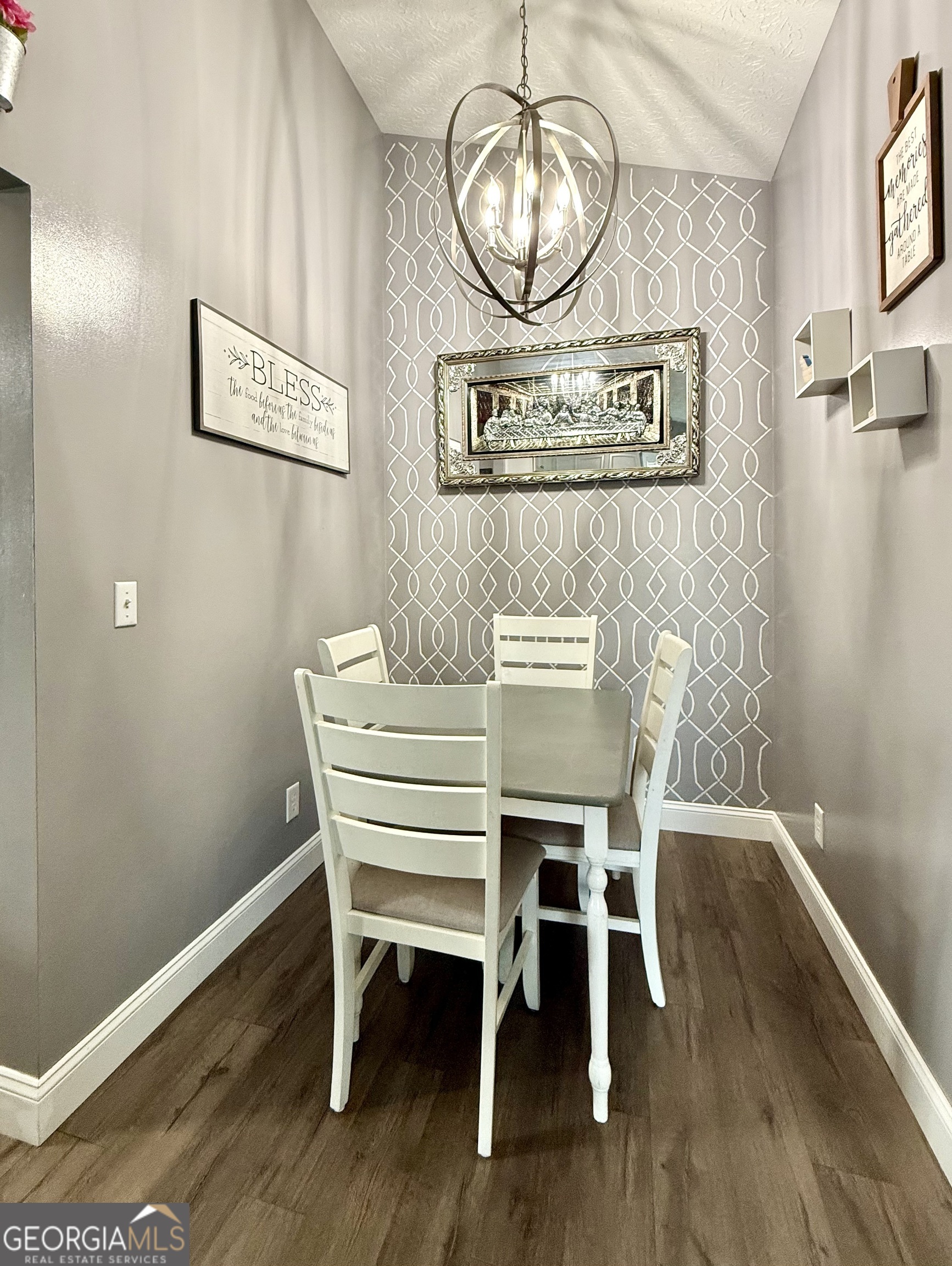 110 Waterloo Drive Mount Airy, GA 30563 - Photo 5 of 24 a view of a dining room with furniture wooden floor and chandelier