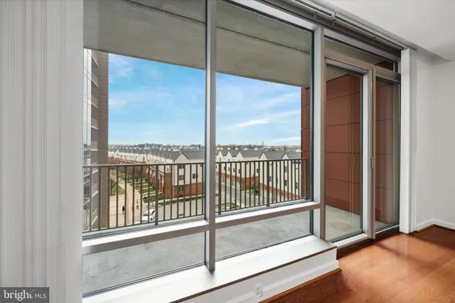 a view of a room that has a large window